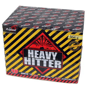 Heavy Hitter Cake by Primed Pyrotechnics in bold hazard-striped packaging, featuring 48 shots and 956g of net explosives for party fireworks.