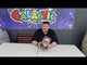 Presenter showcasing Thunder Bolt 25-shot firework cake by Bright Star at Galactic Fireworks, highlighting its loud and colourful effects.