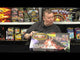 Galactic Fireworks team member holding the Party Box and showing the 27 assorted fireworks inside.