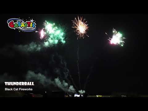 Thunderball firework displaying W-shaped fanned volleys of red and green strobe.