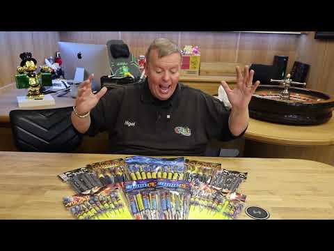 Galactic Fireworks team member unpacking the Monster Rocket Bag to show the huge quantity of 80 mixed rockets.