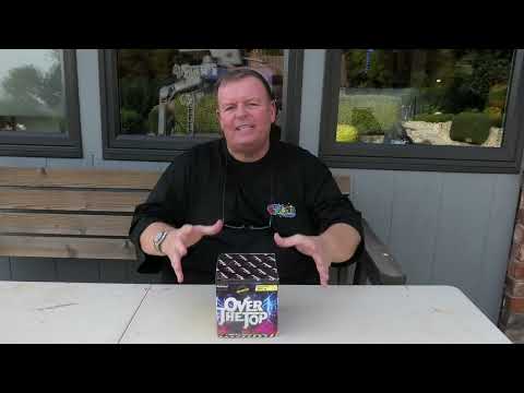 Galactic Fireworks team member holding the Over The Top cake to show the tube size.