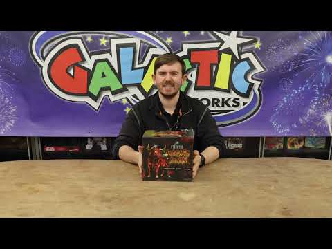 James Turver holding the Raging Bull cake showing the compact size.