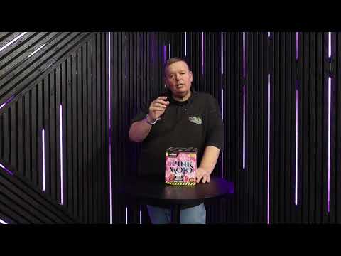 Galactic Fireworks team member holding the Pink Mojo cake and discussing the effects.