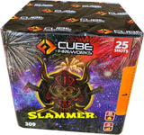 Slammer 25-shot cake by Cube Fireworks with red and white strobe effects, packaged in a colorful box featuring a fiery mask design.