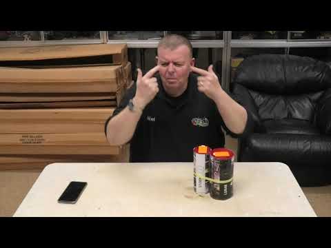 Presenter showcasing Lunar + FREE Storm twin pack by Evolution Fireworks on a table, highlighting the product features for party use.