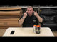 Presenter showcasing Lunar + FREE Storm twin pack by Evolution Fireworks on a table, highlighting the product features for party use.
