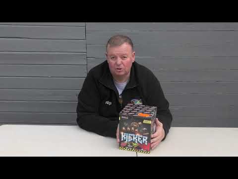 Man presenting Kicker by Primed Pyrotechnics 25-shot firework cake, highlighting product size and packaging for party and celebration use.