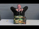 Demonstration of Weapon G Extreme Compound Cake by Galactic Fireworks, showing product size and setup before ignition for party use.