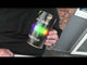 Person holding Spectrum Fountain firework by Standard Fireworks, showcasing its compact size and colorful label for party use.