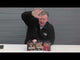 Presenter showcasing Hybrid Cake by Cube Fireworks along with other Spooky Series fireworks, ideal for garden celebrations and party displays.