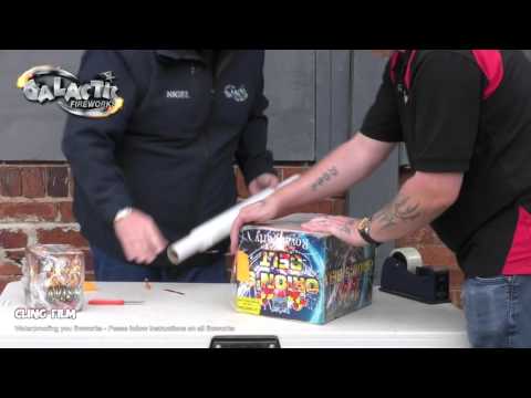 Demonstration of using Waterproof Wrap for Fireworks to protect a firework box, showcasing clear cling film application for outdoor displays.