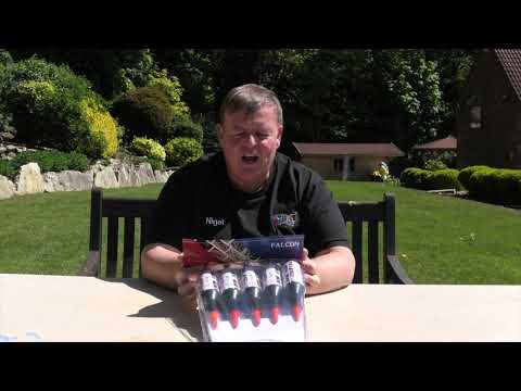 Man holding Falcons | Pack of 5 High-Impact Loud Rockets by Primed Pyrotechnics outdoors, showcasing product size and packaging for party use.